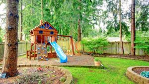 desain taman bermain anak di rumah outdoor halaman belakang